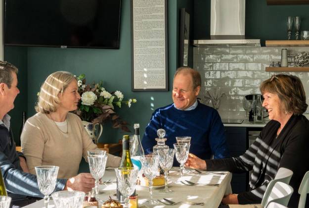 Guests dining in the upstairs sitting room at The Vicarage Geraldine luxury hotel accommodation