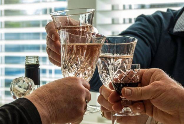 Guests making a toast at The Vicarage Geraldine luxury hotel accommodation